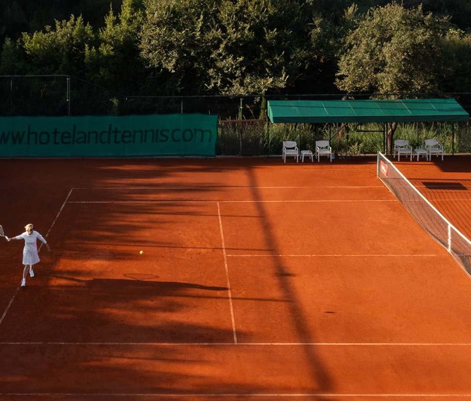 new red clay tennis court livadi nafsika hotel